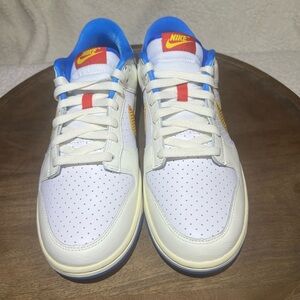 Nike Dunk Low Retro SE (Men’s). White and Blue Sneakers